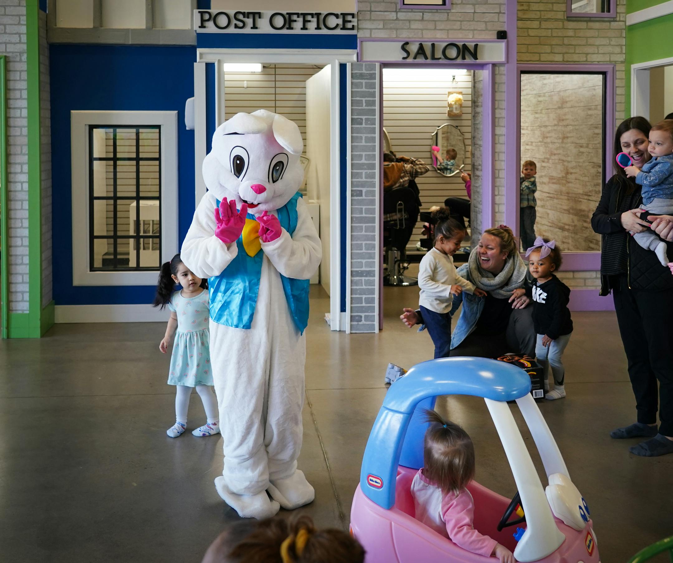 The Easter Bunny stops by the MiniSota Cafe in Maple Grove, Minn.