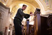 Fr. John Ubel roped off two pews, leaving every third one open, according to a seating chart to evenly space 250 parishioners for this weekend's Mass 