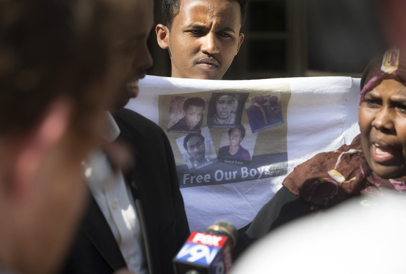 Cousin of Somali-American terrorism suspect Abdurahman Daud, Seleman Abdullahi, held up a Tshirt in support of the six men including his cousin who have been arrested on suspicion of terrorism, during a press conference at the Federal Courthouse in Minneapolis. Minn. on Friday, May 22, 2015 ] RENEE JONES SCHNEIDER &#x2022; reneejones@startribune.com