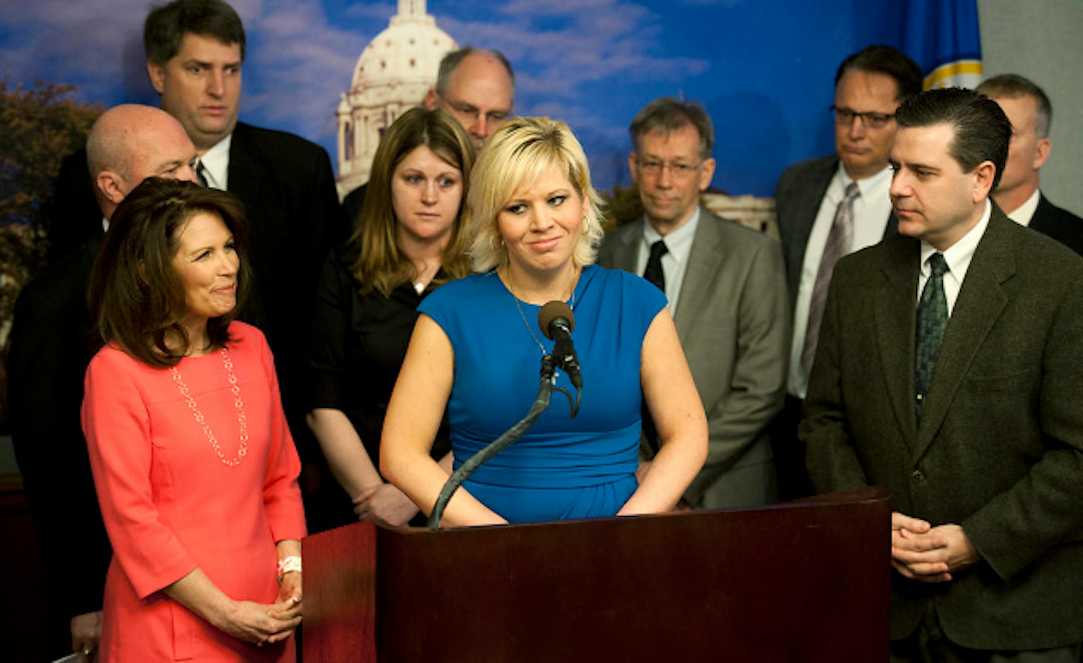 Dental patient Julie Zimmer, center, told how difficult it was when South St. Paul dentist Dr. Mike Perpich was forced to close his practice  last June due to low reimbursement rates paid by the state.  Congresswoman Michele Bachmann and State Senator Sean Nienow (R-Cambridge) held a joint news conference to discuss problems with Medicaid reimbursement rates paid to doctors in Minnesota.  Both are introducing legislation increasing accountability and transparency.  When the questioning turned to Rep. Bachmann's ethics problems from her 2012 presidential campaign, aides closed in blocking reporters and photographers and ushered her out of the room.    Tuesday, April 9, 2013  ]   GLEN STUBBE * gstubbe@startribune.com