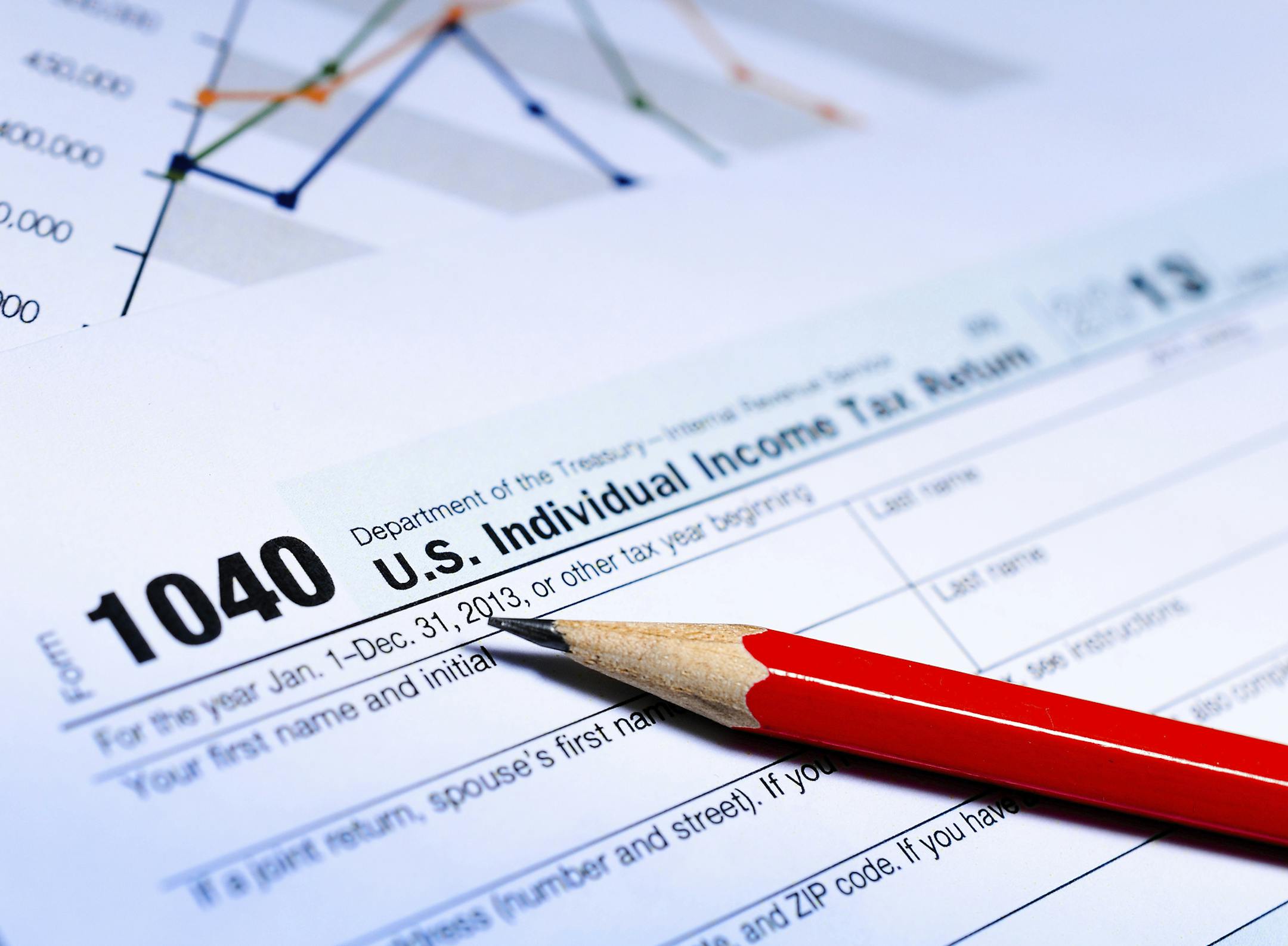 Business documents and tax forms in the close up photo
