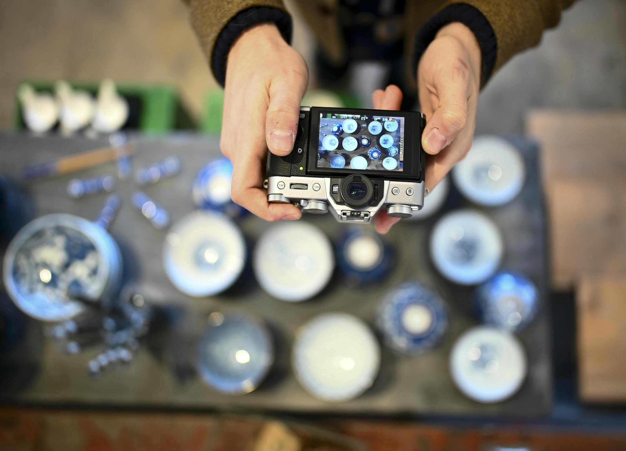Andrew Park took a detail photos of bowls for sale at Umei Thursday. ] Aaron Lavinsky &#xa5; aaron.lavinsky@startribune.com Ashley Halpern and her partner Andrew Park are travel writers for major national magazines. After living all over the world, they decided to move back to the U.S. Guided by an elaborate spreadsheet, they embarked on a yearlong road trip to check out 229 cities and towns before settling on...Minneapolis! Since settling in a year ago, they've become "MnEvangelists," checking