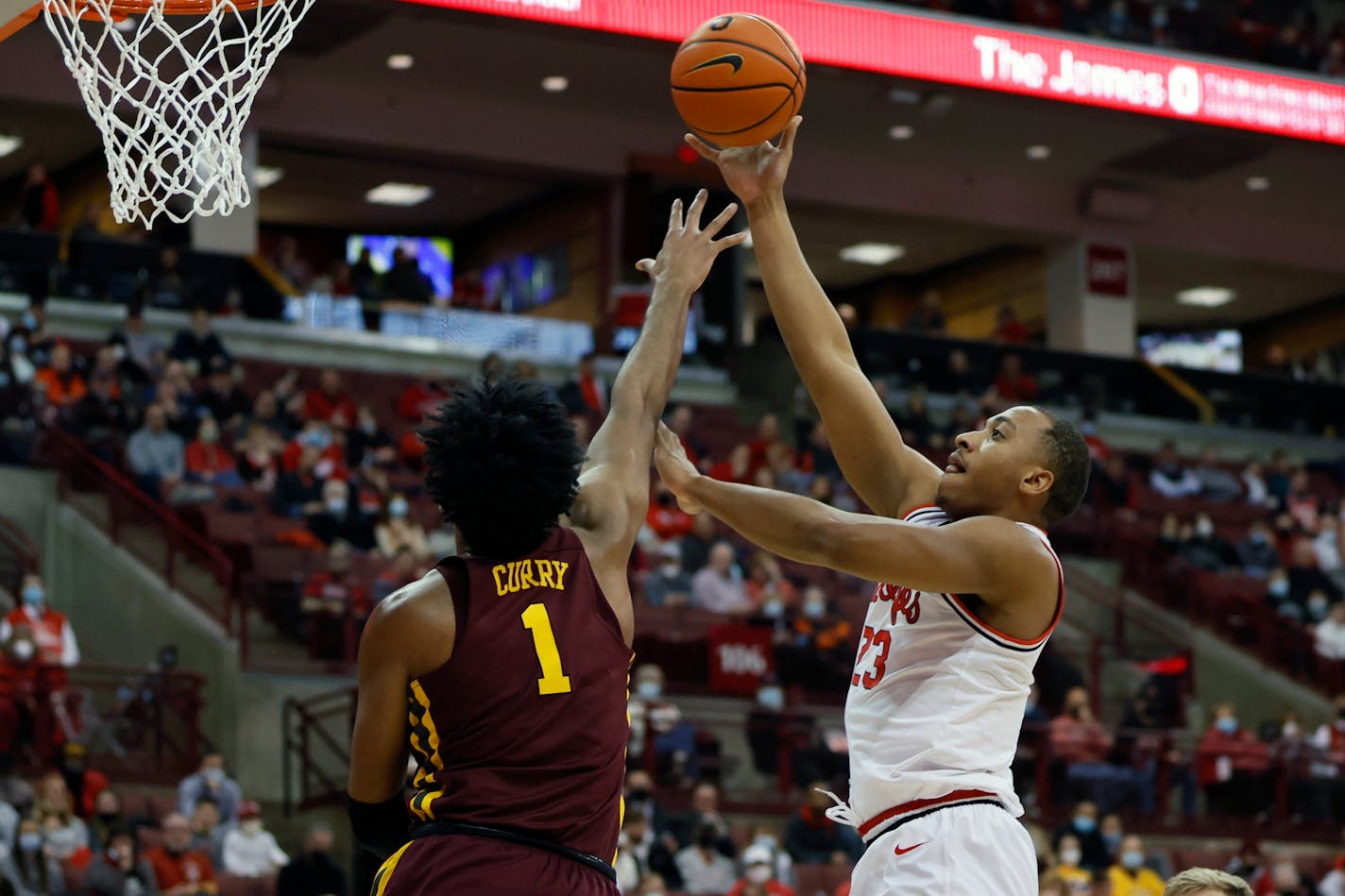 Ohio State's Zed Key shoots over Minnesota's Eric Curry during the second half Tuesday