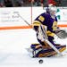 Minnesota State goaltender Dryden McKay (29) makes the save against the Bowling Green during an NCAA college hockey game, Saturday, Dec. 15, 2018, in 