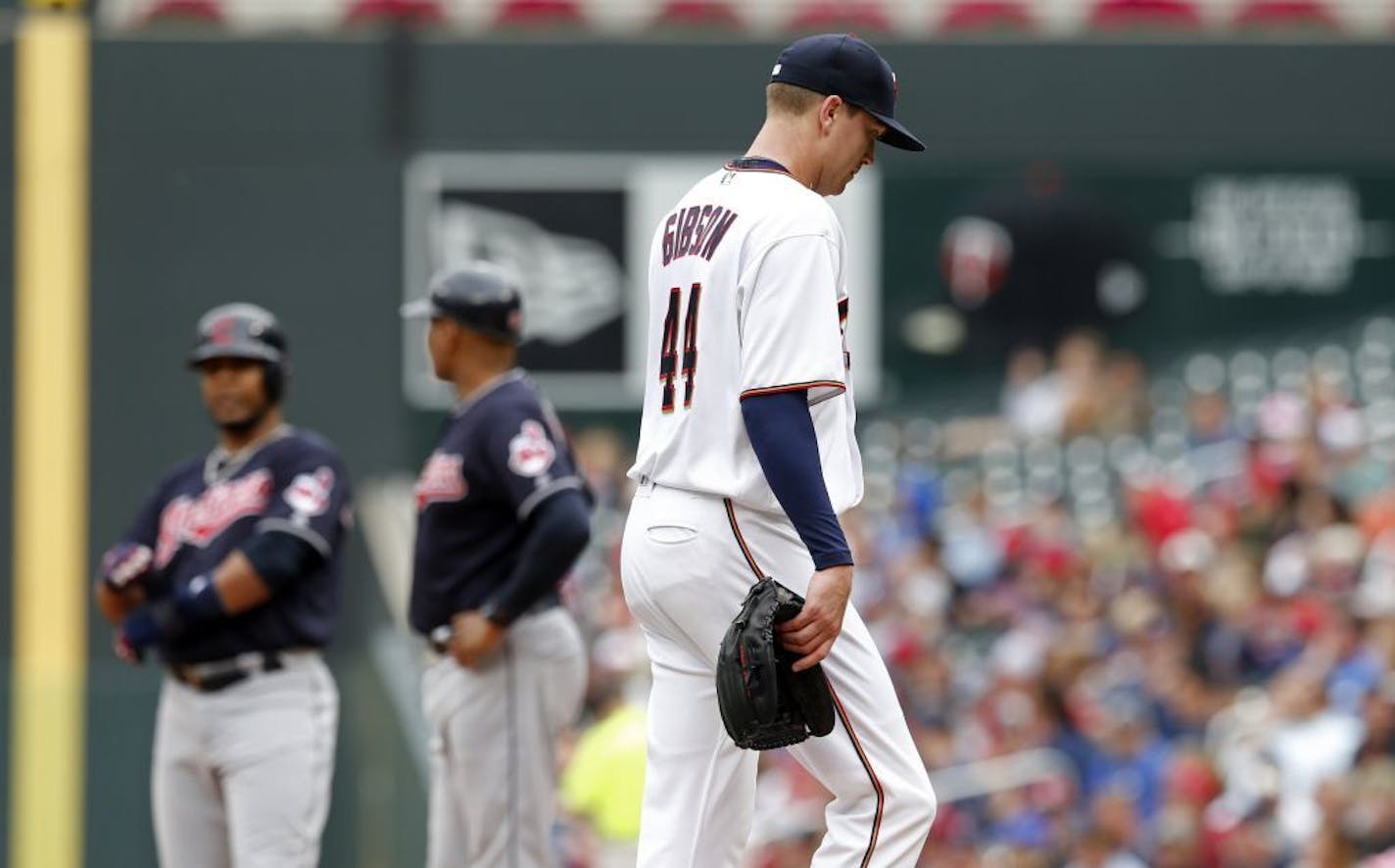 Minnesota Twins pitcher Kyle Gibson heads to the dugout after being pulled in the fifth inning of the first game of a baseball doubleheader against the Cleveland Indians Thursday, Aug. 17, 2017, in Minneapolis.