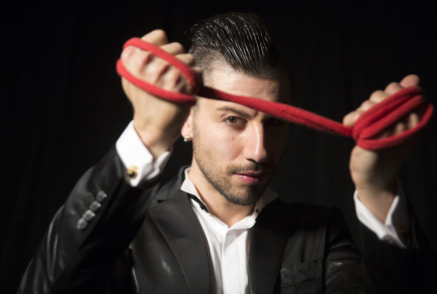 Andrew Basso is an Italian daredevil magician known as "The Escapologist" who fancies himself a latter day Houdini. ] LEILA NAVIDI leila.navidi@startribune.com / BACKGROUND INFORMATION: Monday, March 16, 2015. Andrew Basso will perform with other magicians in "The Illusionists &#xf1; Witness the Impossible" at the Ordway Theater March 24-29, 2015.