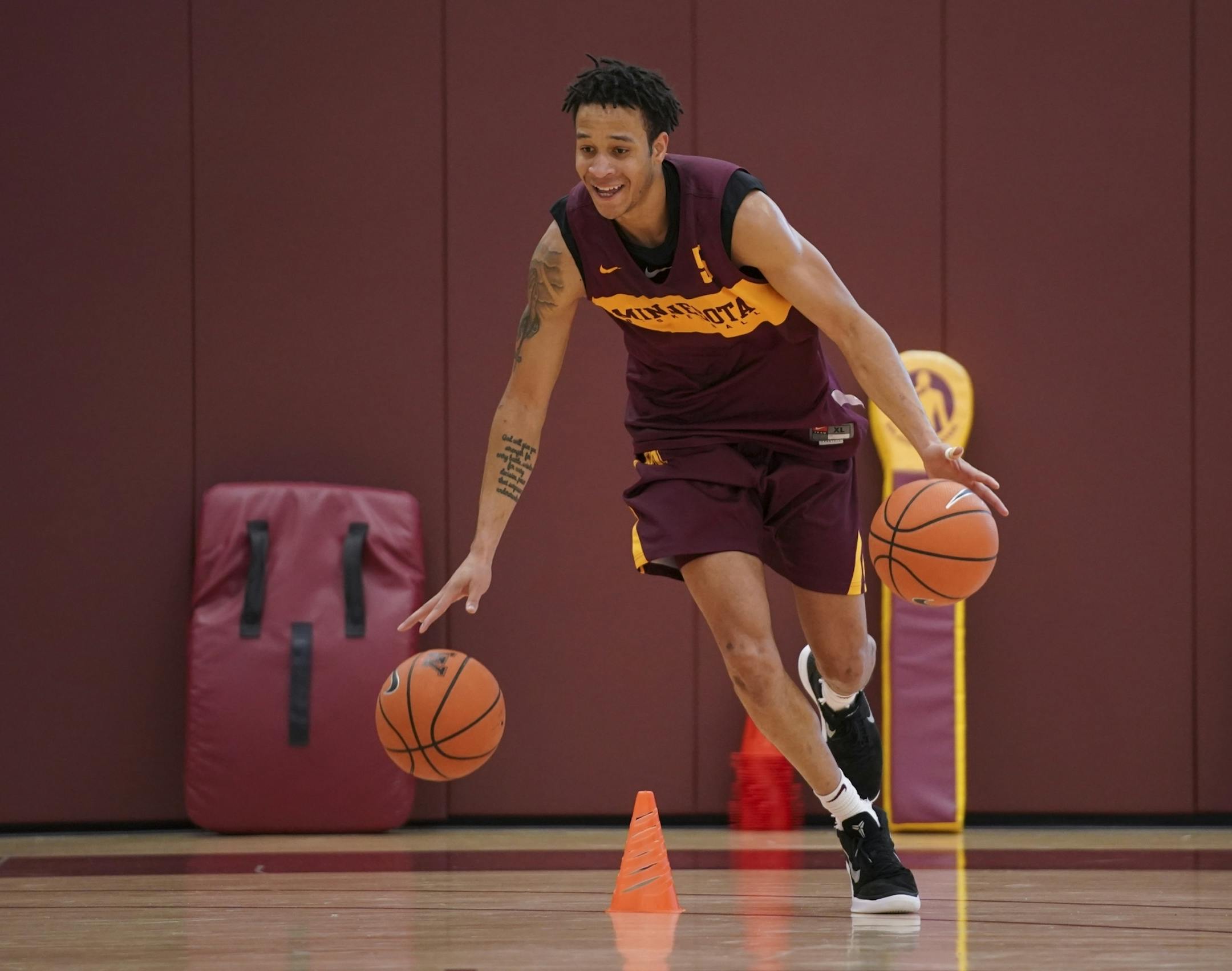Guard Amir Coffey took part in a drill during practice Tuesday afternoon.