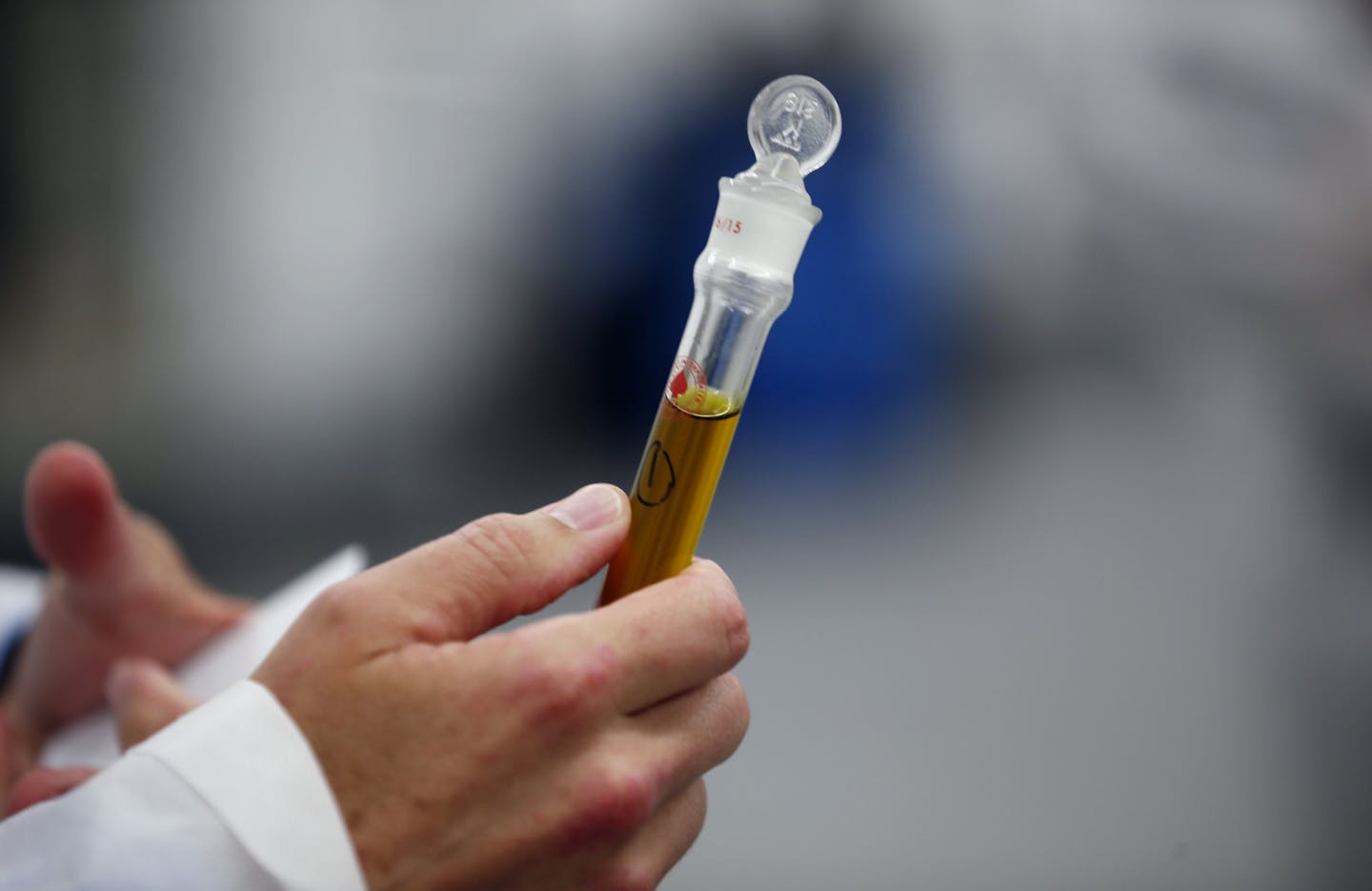 Dr. Andrew Bachman Co-founder and chief medical officer held a tube of terpenes, which was extracted from marijuana plants during a tour of Leafline labs a 42,000-square-foot marijuana greenhouse and production facility Wednesday June 17, 2015 in Cottage Grove MN.] Jerry Holt/ Jerry.Holt@Startribune.com