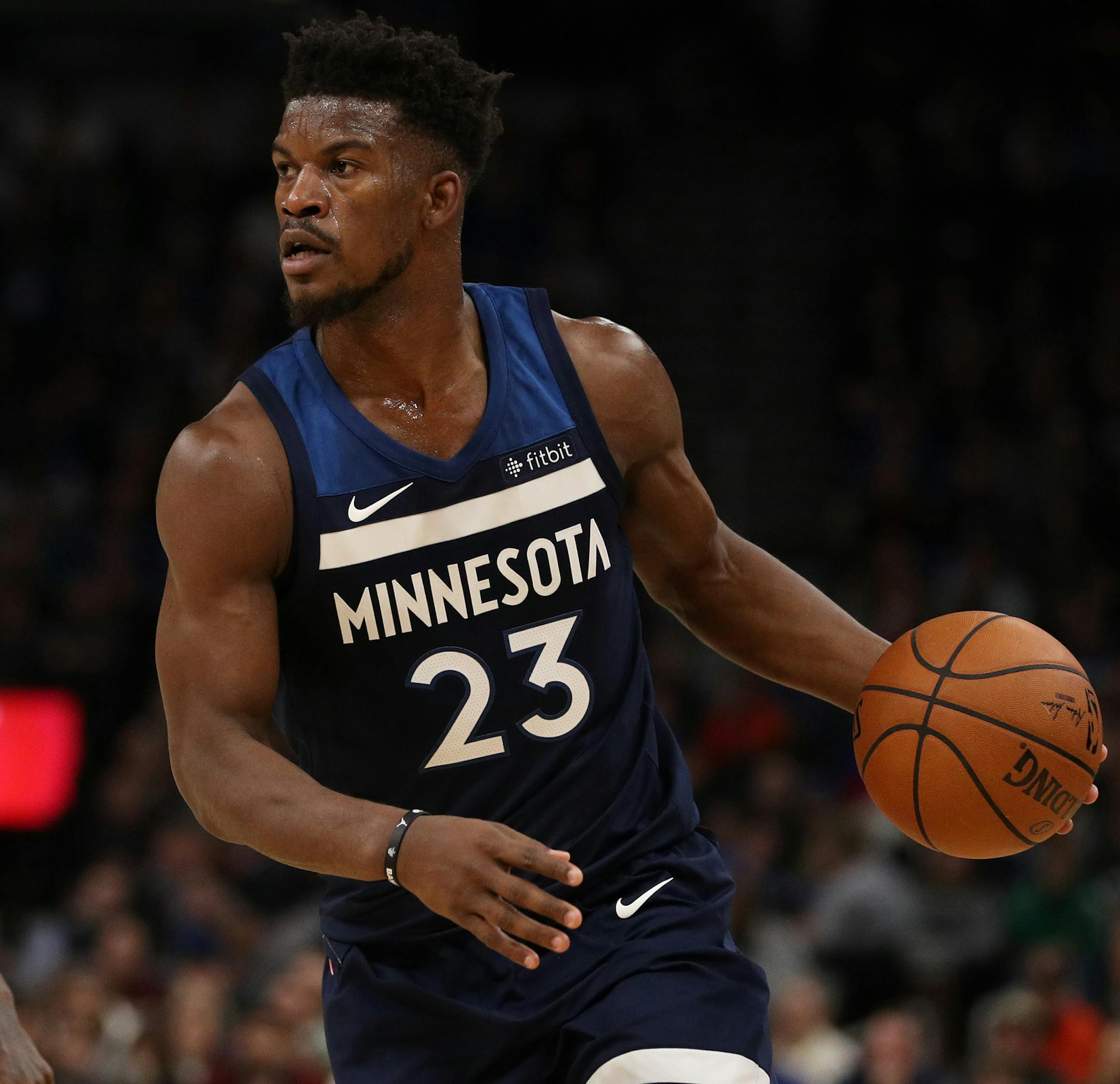 Minnesota Timberwolves forward Jimmy Butler (23) looked for an open teammate as Oklahoma City Thunder forward Paul George (13) defended in the first half. ] ANTHONY SOUFFLE &#xef; anthony.souffle@startribune.com Game action from an NBA game between the Minnesota Timberwolves and the Oklahoma City Thunder Friday, Oct. 27, 2017 at the Target Center in Minneapolis.