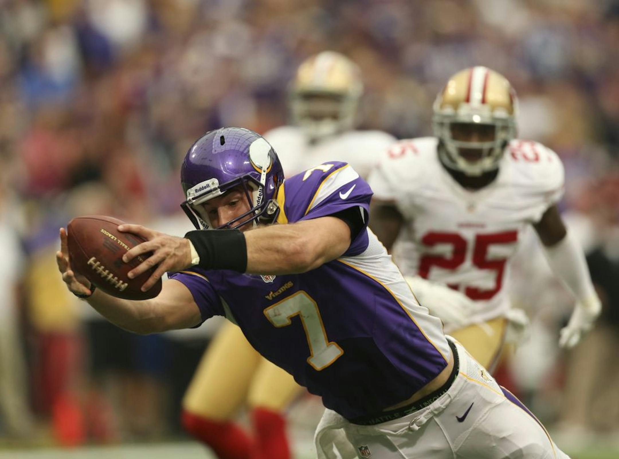 Christian Ponder dived into the end zone on a 23-yard touchdown run to give the Vikings a 14-3 lead midway through the second quarter.