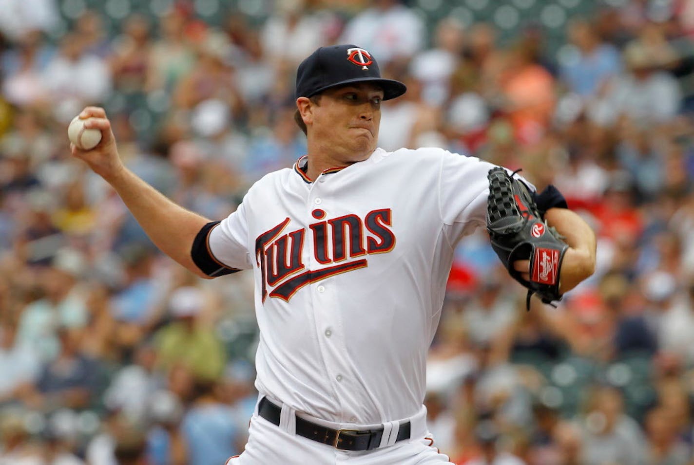 Minnesota Twins starting pitcher Kyle Gibson delivers to the Detroit Tigers during the first inning of a baseball game in Minneapolis, Sunday, July 12, 2015. (AP Photo/Ann Heisenfelt)