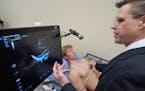 Thomas Pahl, physician assistant at Glacial Ridge Health Systems, demonstrated the capability of  point-of-care ultrasound equipment for quick diagnos