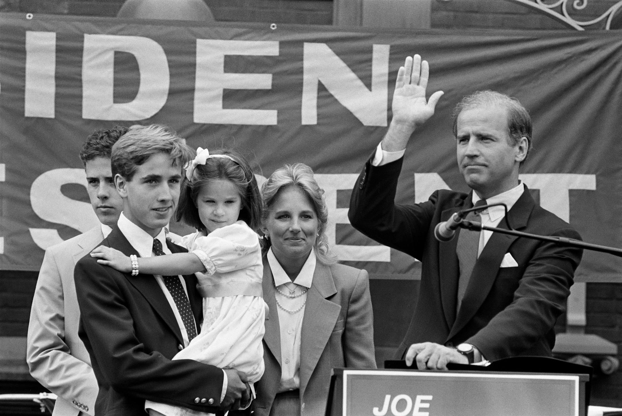 FILE - Sen. Joe Biden with his family after announcing his candidacy for Democratic presidential nomination, Wilmington, De., June 9, 1987. During this pandemic season, when the former vice president only periodically heaves to the surface before sinking away from public view, it is awfully powerful to see him not just on the campaign trail, but also on the campaign trail while still in the prime of his life. (Keith Meyers/The New York Times)