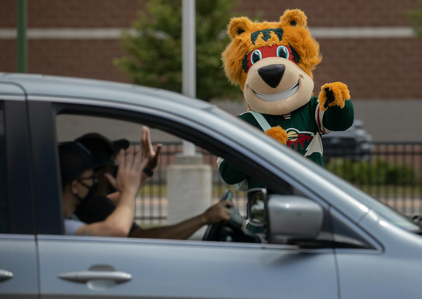 The Minnesota Wild mascot "Nordy" waved to those who received backpacks and school supplies at the annual Greater Twin Cities United Way's distribution event at Allianz Field, Thursday, August 13, 2020 in St. Paul, MN. ] ELIZABETH FLORES • eflores@startribune.com