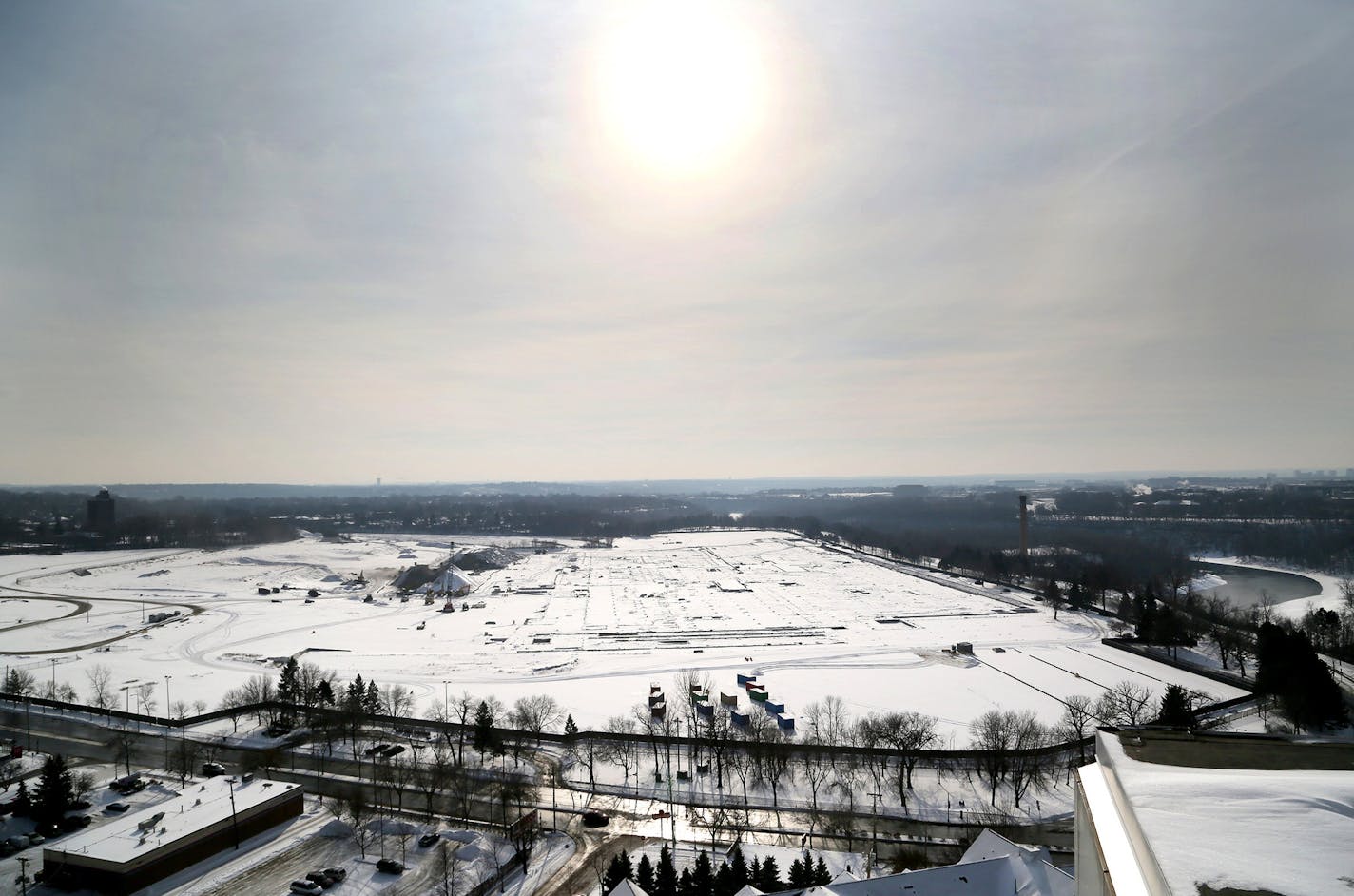 The massive Ford site in Highland Park, which occupies 144 acres including the Highland Little League Park, is now clear of buildings with pollution cleanup continuing and the remaining concrete foundations and slabs should be gone by mid-summer. The property is expected to go on the market by the end of 2015. Here, the massive Ford site is seen from the 24th floor of the nearby 740 River Drive luxury apartment building Wednesday, Jan. 14, 2015, in St. Paul, MN.](DAVID JOLES/STARTRIBUNE)djoles@s