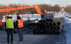 Work has begun on the 66th Street reconstruction project in Richfield. Here, crews from the Metropolitan Council prepared pipes to divert sewage while