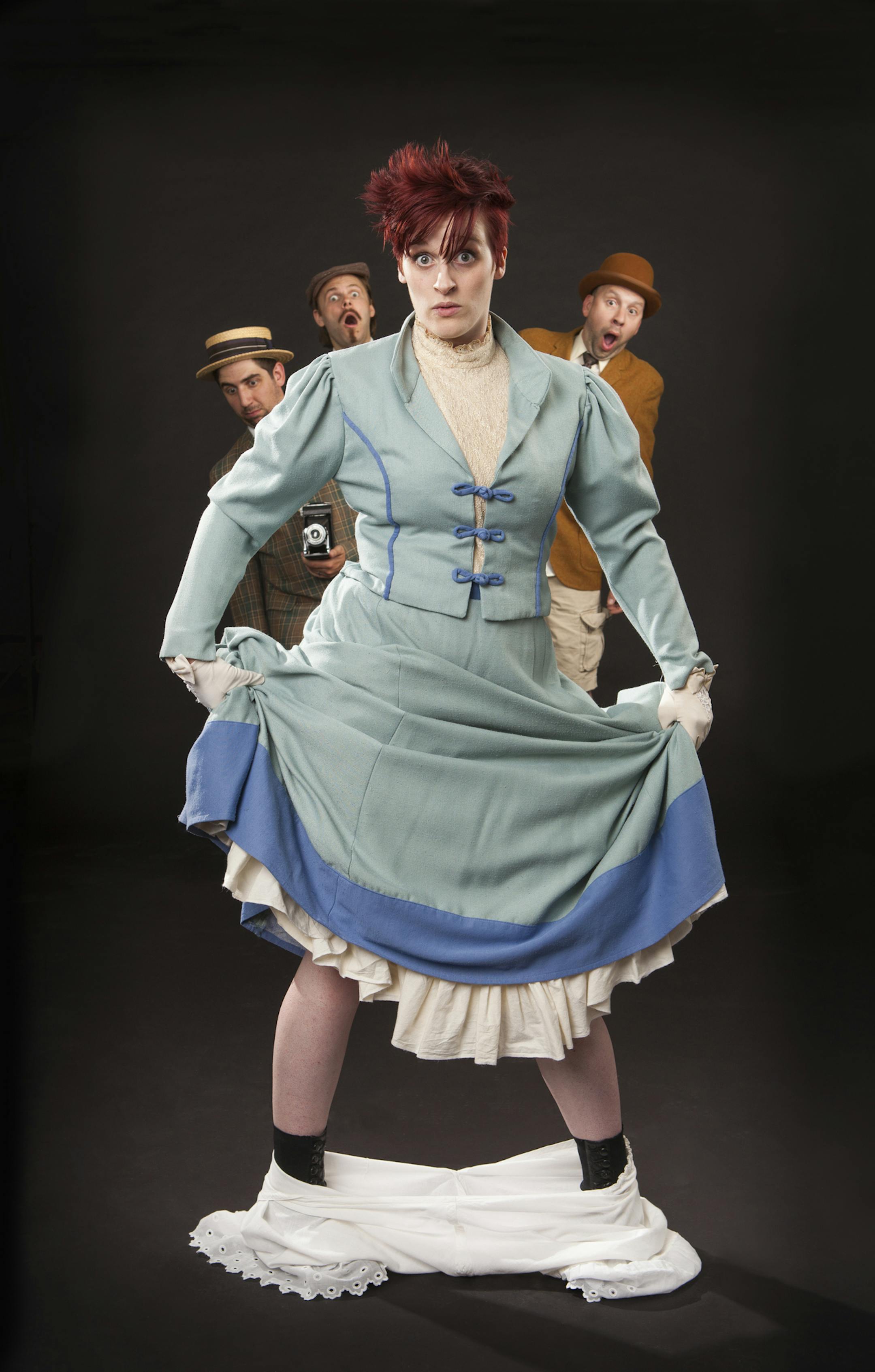 In Steve Martin's THE UNDERPANTS, a respectable couple in 1910 is watching a parade when it happens ‚Äì Louise‚Äôs undergarment accidentally falls down to her ankles. She pulls her bloomers back up but now everyone is talking. Shown: Amy Pirkl (center); John T. Zeiler, Nic Delcambre, and David Schlosser.