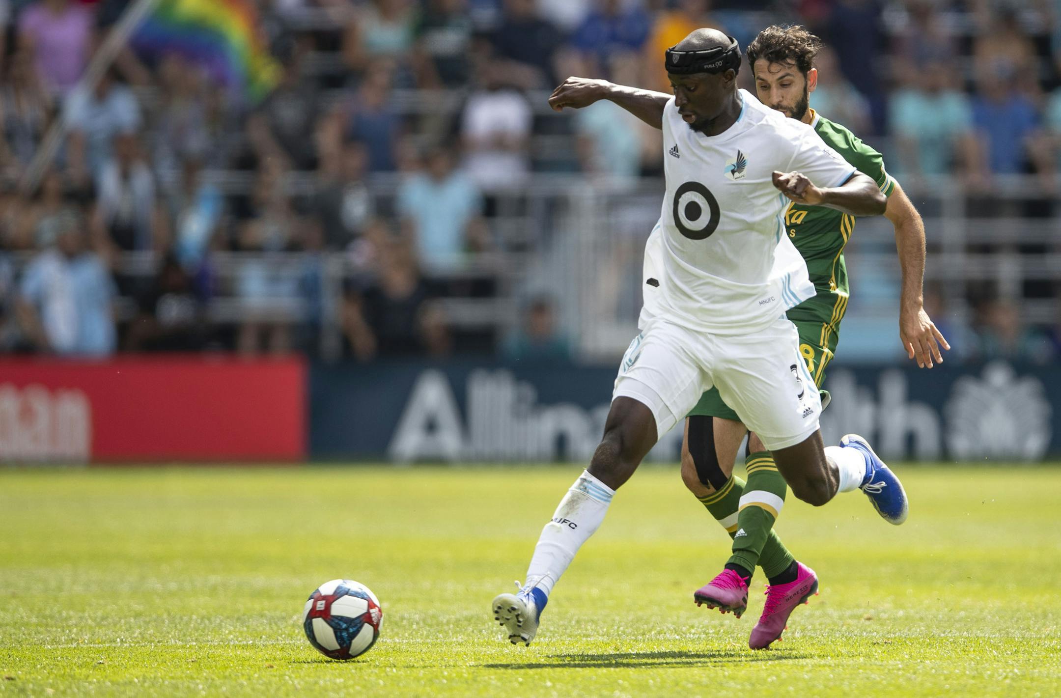 Minnesota United defender Ike Opara attempted to regain control of the ball in a game against Portland on Aug. 4. Opara, acquired before the season, was named MLS Defender of the Year, winning the award for the second time.