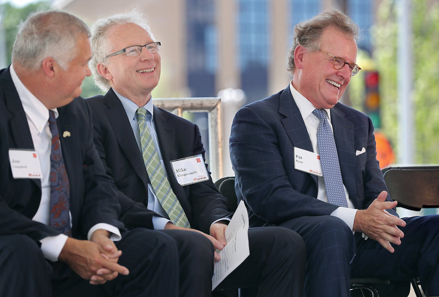 Executive Vice President and director of Government and Community Relations for Wells Fargo &amp; Company Jon Campbell, left, Star Tribune Publisher and CEO Mike Klingensmith, center, and Ryan Companies President and CEO Pat Ryan, celebrated the grand opening of Minneapolis East Town Towers, Wednesday, July 20, 2016 in downtown Minneapolis, MN. ] (ELIZABETH FLORES/STAR TRIBUNE) ELIZABETH FLORES ¥ eflores@startribune.com