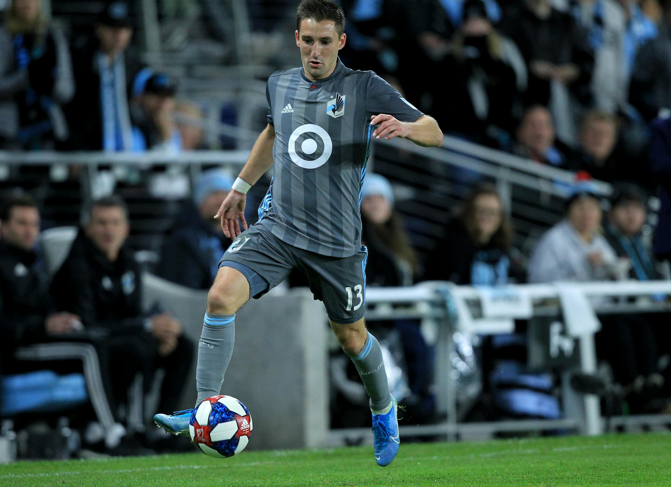 Minnesota United defender Ethan Finlay passes against the LA Galaxy during the second half of an MLS first-round playoff soccer match Sunday, Oct. 20, 2019 in St. Paul, Minn.(AP Photo/Andy Clayton-King)