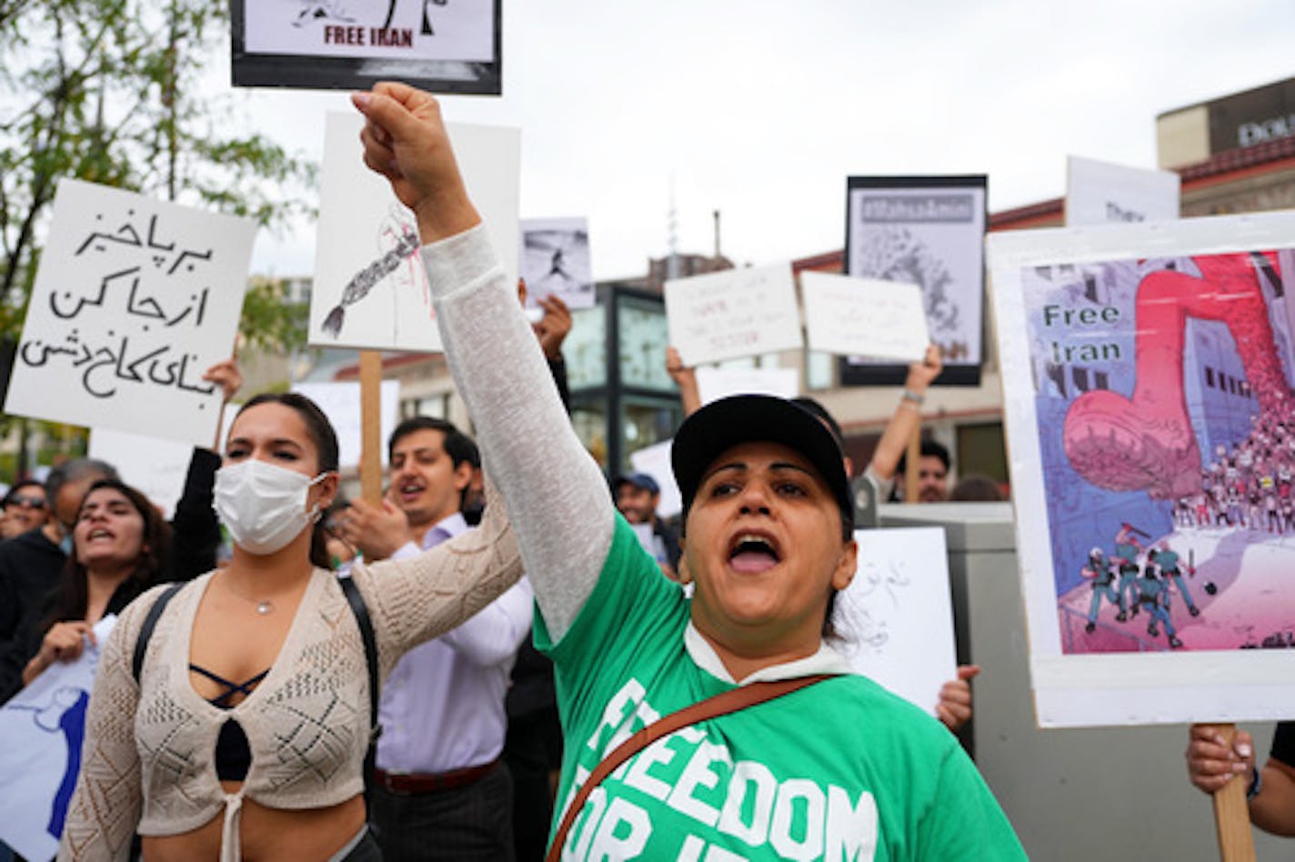 Fahimeh Maanavi of Minneapolis chanted along with fellow protesters during a gathering in support of a nationwide uprising against tyranny in Iran and to condemn the killing of Mahsa Aminini by 'morality police' Saturday, Sept. 24, 2022 in downtown Minneapolis. ] ANTHONY SOUFFLE • anthony.souffle@startribune.com