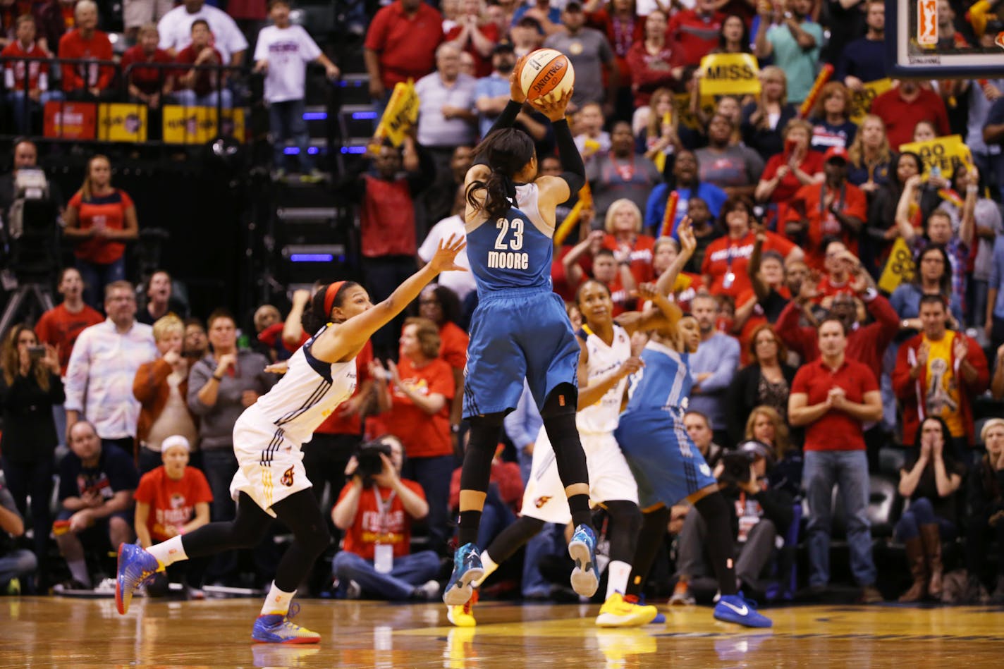 Minnesota Lynx forward Maya Moore (23) makes the game winning three point shot at the buzzer during the fourth quarter. ] KYNDELL HARKNESS kyndell.harkness@startribune.com / BACKGROUND INFORMATION: During game three of the WNBA Finals at Bankers Life Field House in Indianapolis on Friday, October 9, 2015.