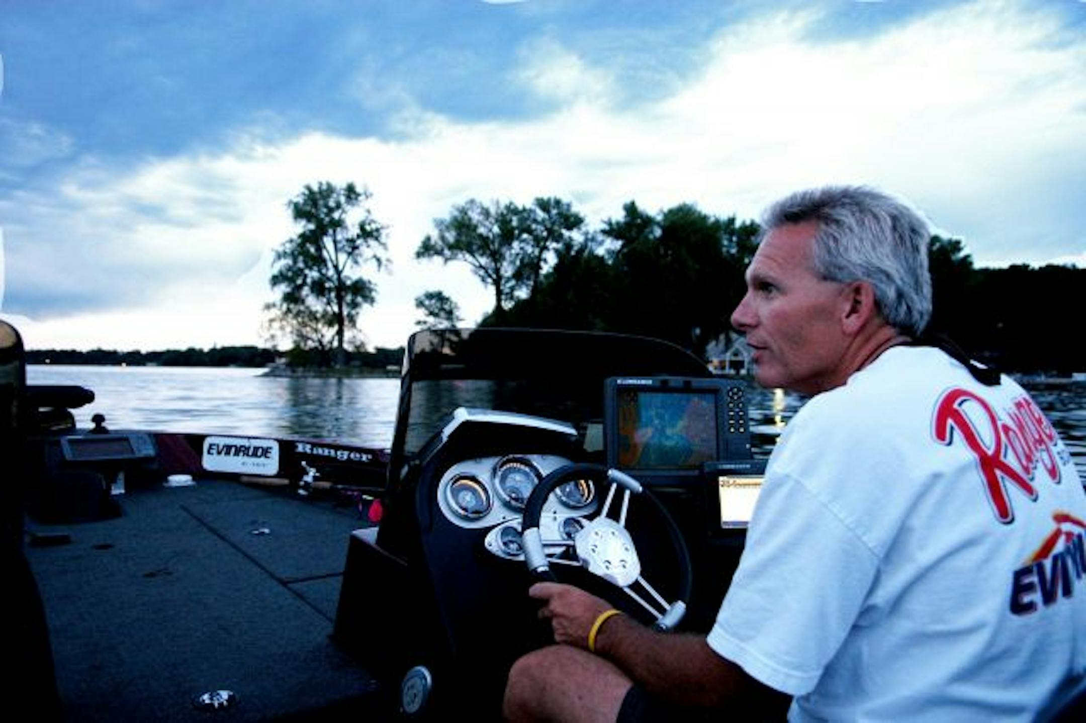 DENNIS ANDERSON ... 7/2009 ... Bob Turgeon of Plymouth moves from one spot to another on Lake Minnetonka, using his electronics to differentiate various lake-bottom contours, showing why some might hold muskies.