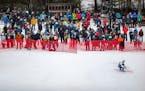 A large crowd of people, most of them family members of racers, gathered by the finish line to watch the MSHSL Boys and Girls Alpine Skiing State Meet