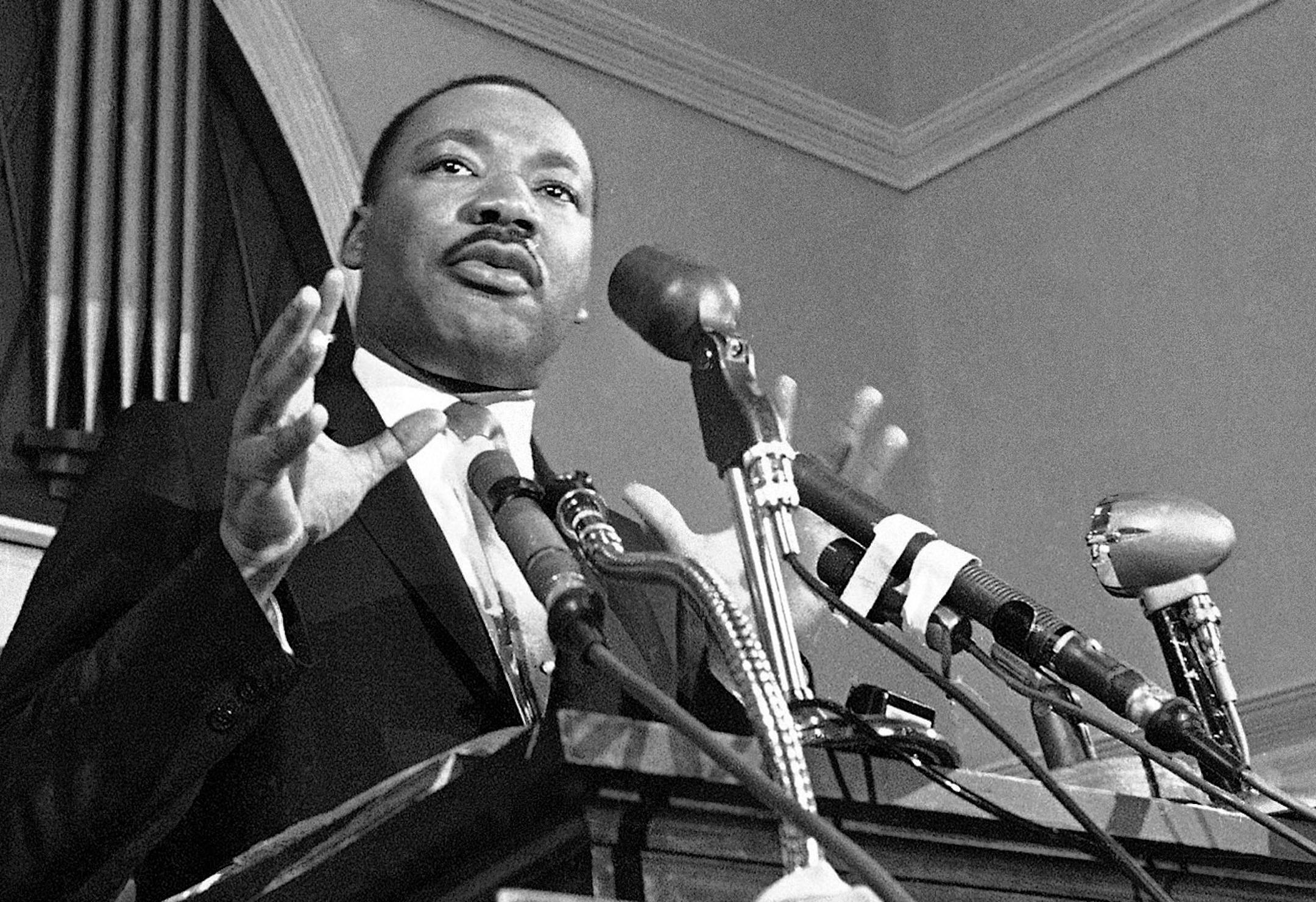 FILE - In this 1960 file photo, Martin Luther King Jr. speaks in Atlanta. The civil rights leader had carried the banner for the causes of social justice &#x2014; organizing protests, leading marches and making powerful speeches exposing the scourges of segregation, poverty and racism. (AP File Photo)