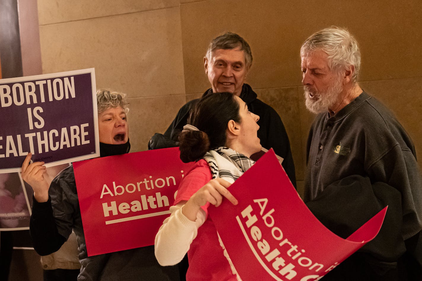 Pro Choice and Pro Life protesters faced off outside the House Chamber Thursday, Jan. 19, 2023 St. Paul, Minn. This was the first day an abortion bill was being heard in the House. ] GLEN STUBBE • glen.stubbe@startribune.com