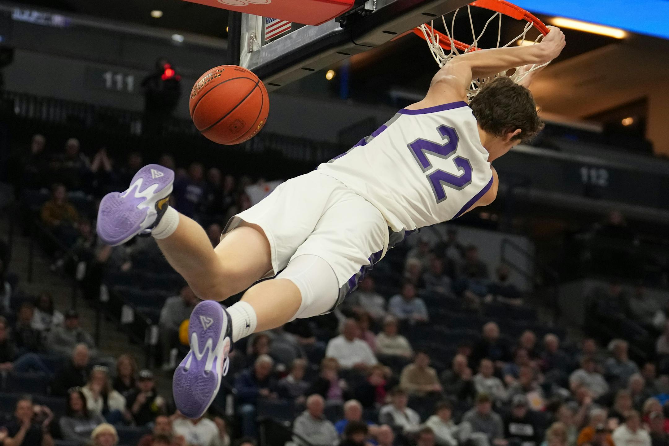 Albany guard Tysen Gerads (22) dunks the ball in the first half.