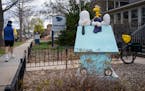 ‘Patient Puppy’ Snoopy (and Woodstock), made in 2004, sits in front of the Grand Avenue Veterinary Center in St. Paul as seen on Tuesday.