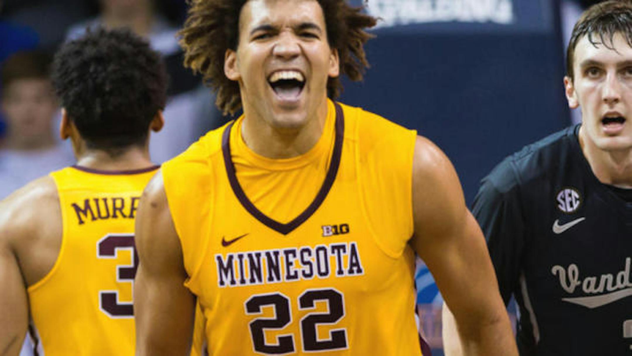 Dec 3, 2016; Sioux Falls, SD, USA; Minnesota Gophers center Reggie Lynch (22) celebrates his basket in the second half against the Vanderbilt Commodores at Sanford Pentagon. The Minnesota Gophers beat the Vanderbilt Commodores 56-52. Mandatory Credit: Brad Rempel-USA TODAY Sports