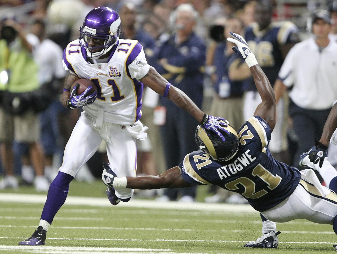 Vikings receiver Jaymar Johnson stiff- armed Rams Atogwe Oshiomogho helping pickup a first down in the first quarter.