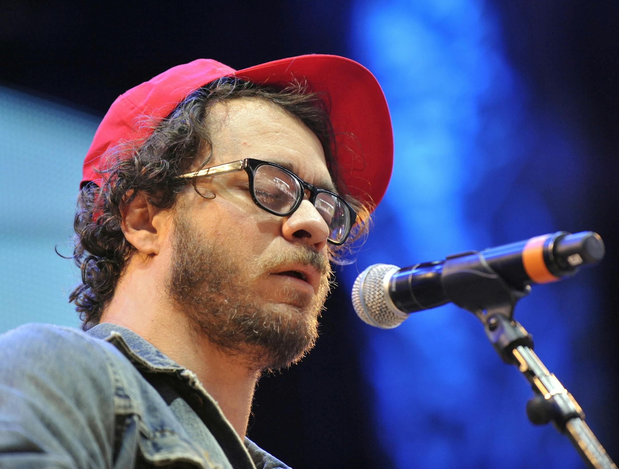 Amos Lee performs during the Farm Aid 2013 concert at Saratoga Performing Arts Center in Saratoga Springs, N.Y., Saturday, Sept. 21, 2013. (AP Photo/Hans Pennink)