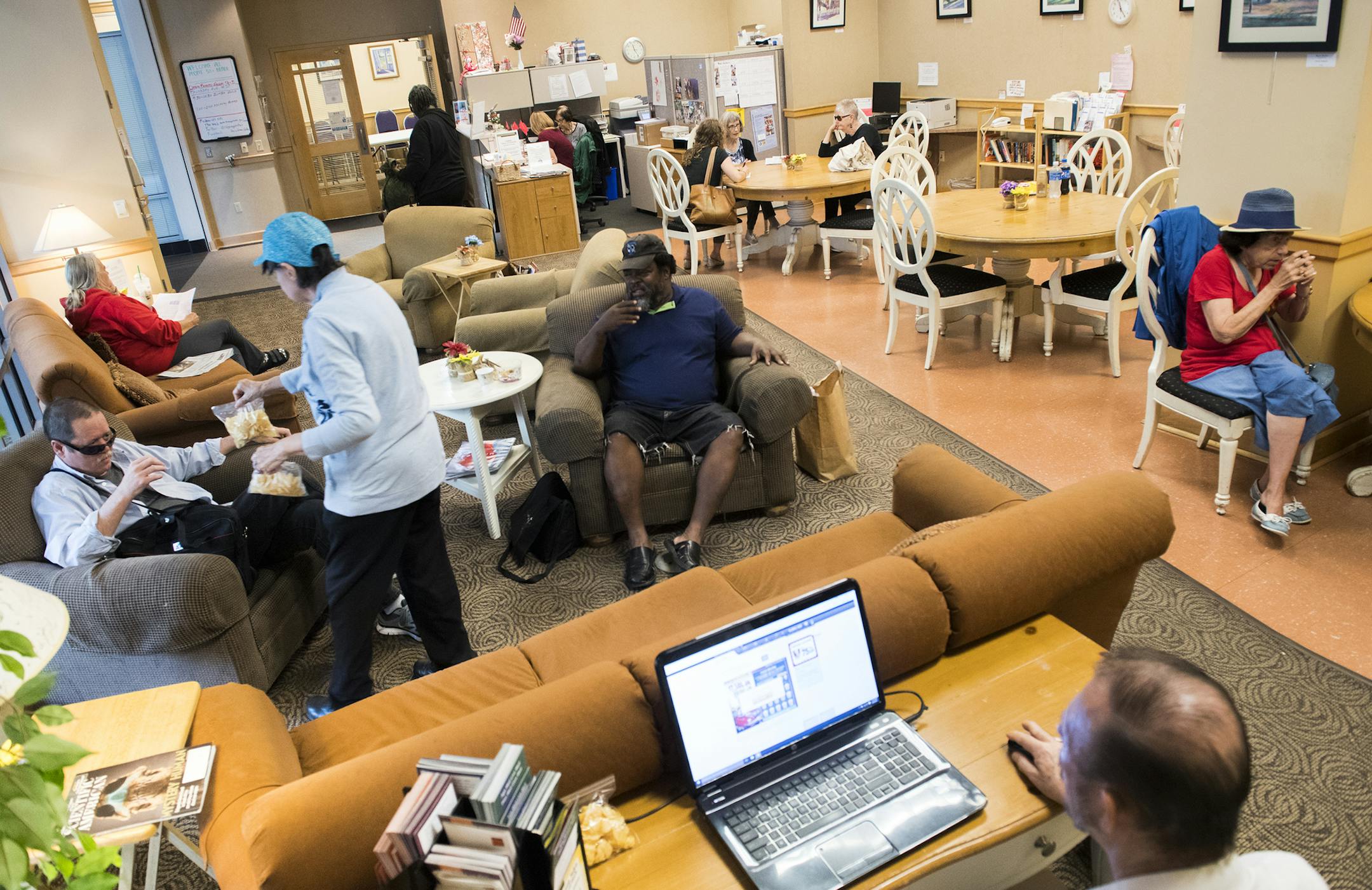 Visitors and hosts hangout at the Skyway Senior Center on Thursday. Hosts are volunteers that help keep the center functioning and ensuring all visitors have what they need. ] Isaac Hale ï isaac.hale@startribune.com The Skyway Senior Center is a place for individuals over the age of 50 to socialize with people in their age group and participate in various classes, events, and informational sessions. Open since 2001, the center is the only place of its kind in the downtown area that caters t