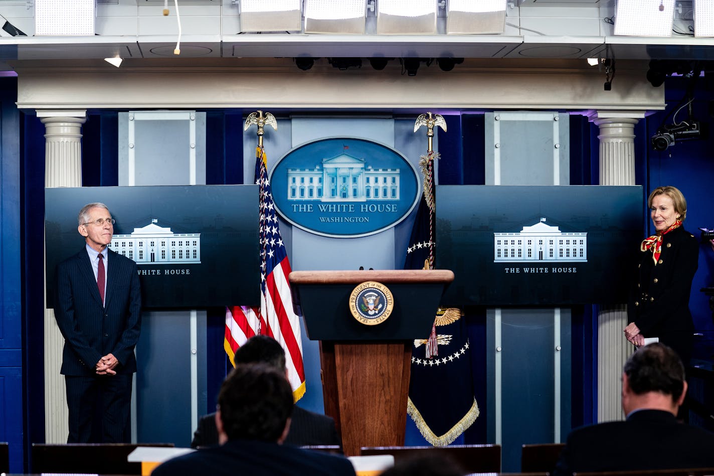 FILE -- Drs. Anthony Fauci and Deborah Birx, the top public health officials overseeing the federal response to the coronavirus, during a daily coronavirus briefing at the White House in Washington, March 31, 2020. Despite growing evidence that the pandemic is still raging, administration officials said on Tuesday, May 5, that they had made so much progress in bringing it under control that they planned to wind down the coronavirus task force in the coming weeks and focus the White House on rest