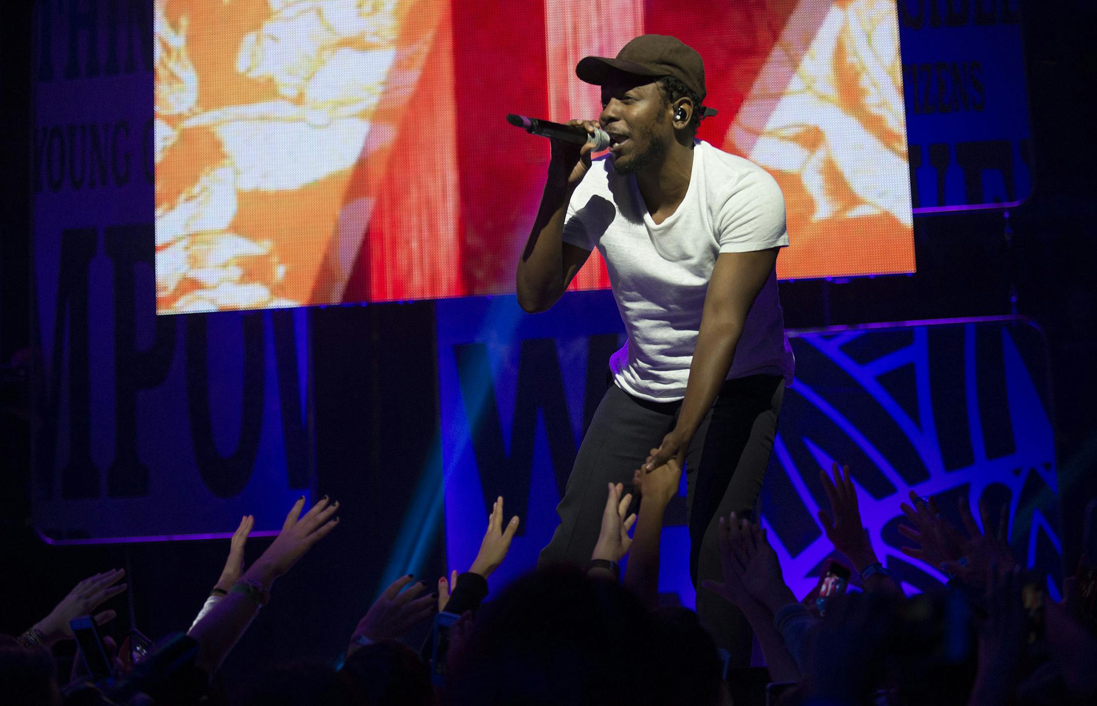 Kendrick Lamar seen during We Day at the Air Canada Centre on Thursday, Oct. 2, 2014, in Toronto, Canada. (Photo by Arthur Mola/Invision/AP) ORG XMIT: INVW