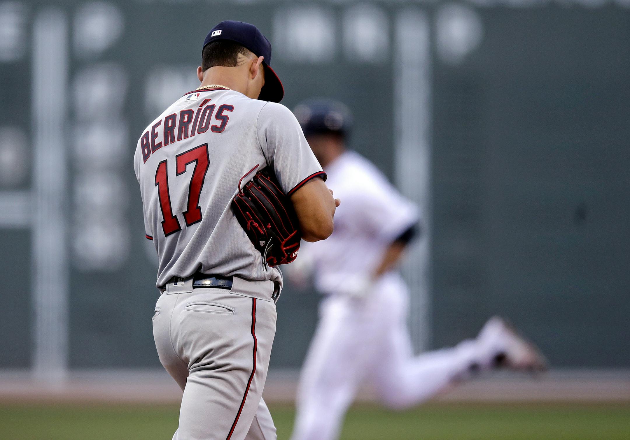 Twins starter Jose Berrios prepared a fresh baseball as the Red Sox’s Mitch Moreland rounded the bases on a solo home run during the first inning at Fenway Park on Monday.
