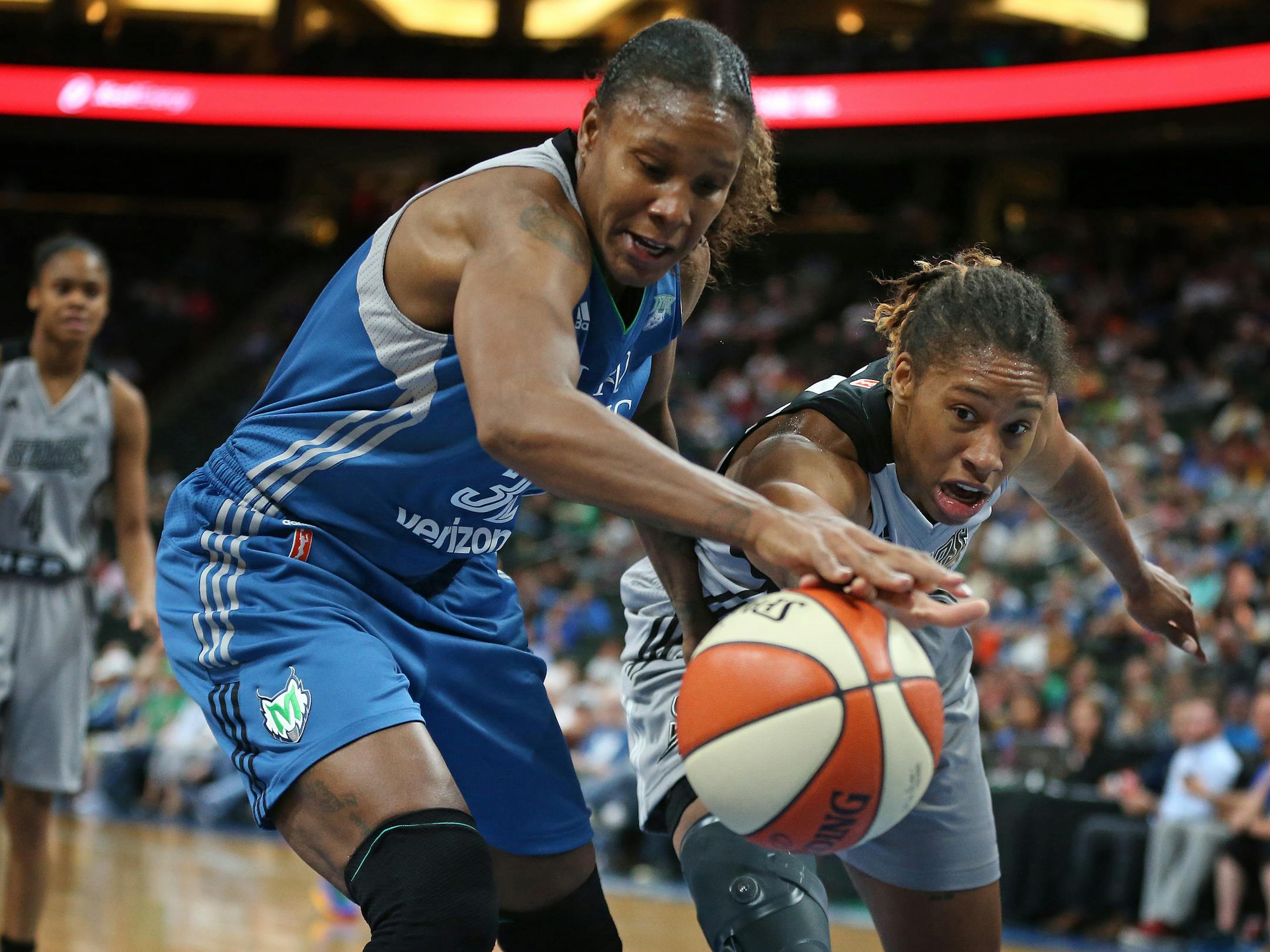 Minnesota Lynx forward Rebekkah Brunson (32) battled San Antonio Stars guard Alex Montgomery (6) for a rebound Sunday, June 25, 2017 at Xcel Energy Center in St. Paul , MN.