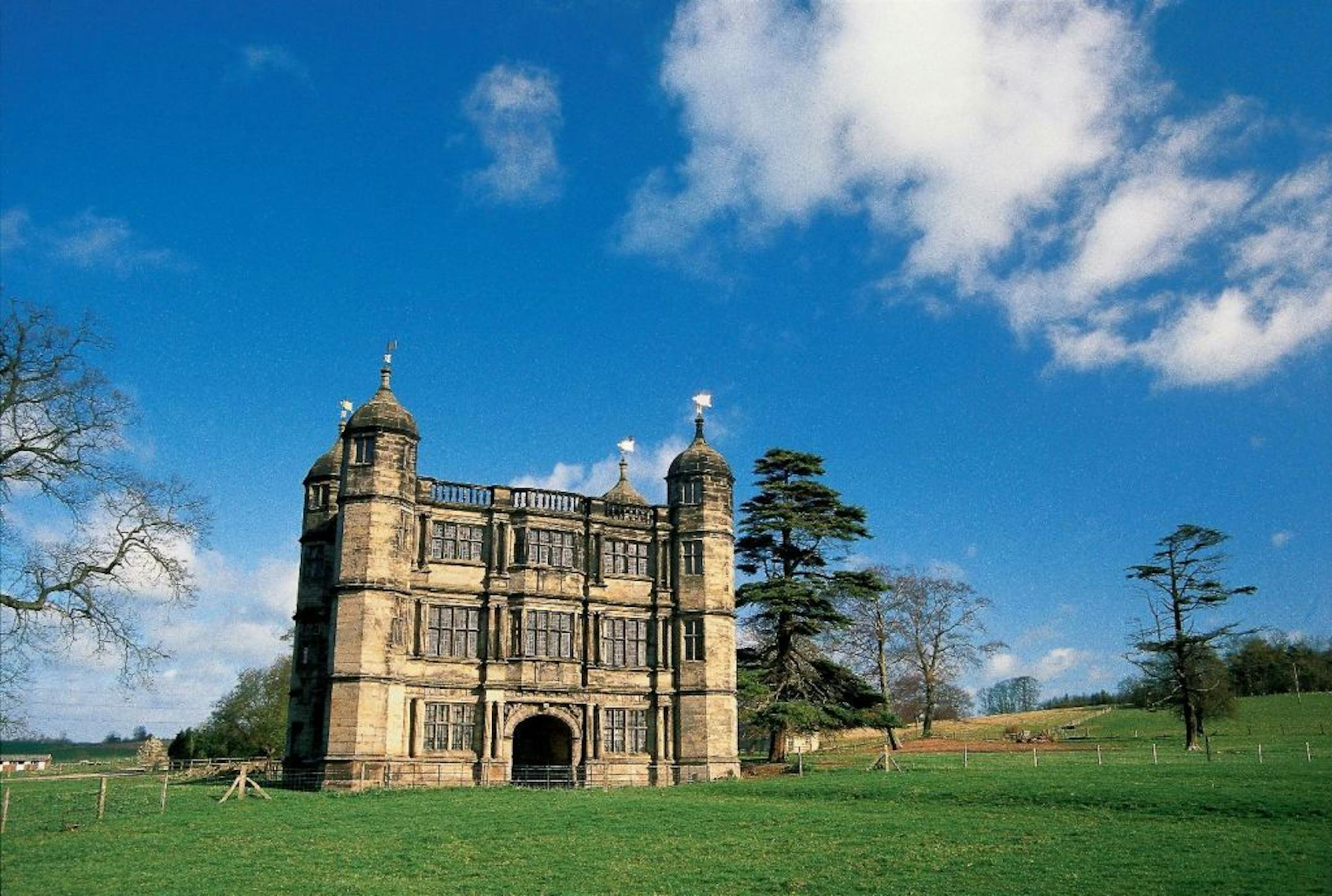 Tixall Gatehouse was built in 1580 to stand in front of an older house, now gone. Mary, Queen of Scots was imprisoned here for two weeks in 1586. Today, one turret houses the Gatehouse clock, which still strikes the hour "but has no hands or face to show the time, which in seems in any event unimportant, even vulgar here."