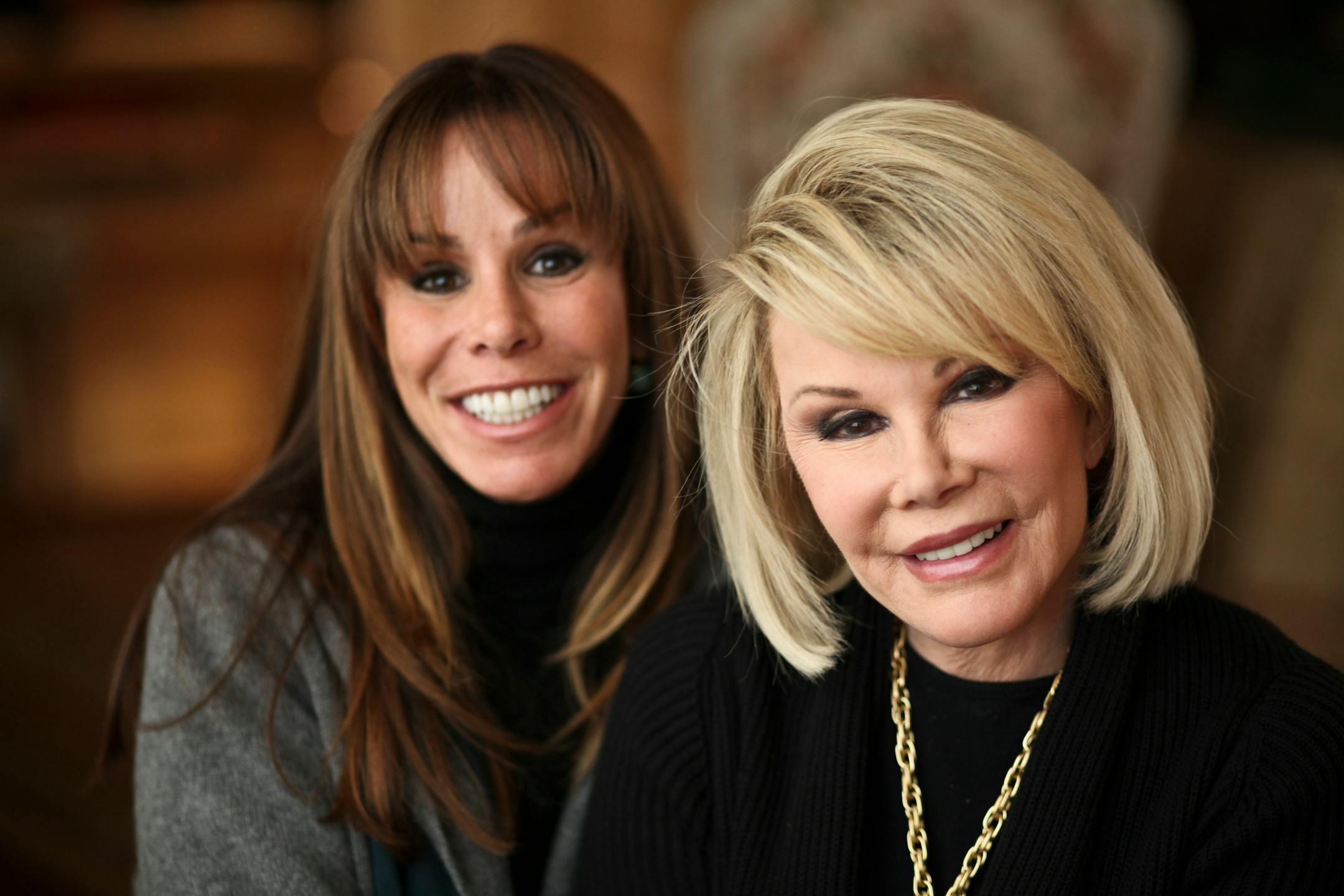 Joan Rivers, right, and her daughter, Melissa, at Rivers' apartment in New York, on Jan. 11, 2011. The comedian moved in with her daughter in Los Angeles last summer and a reality TV camera crew followed, filming "Joan & Melissa: Joan Knows Best?" (Fred R. Conrad/The New York Times)