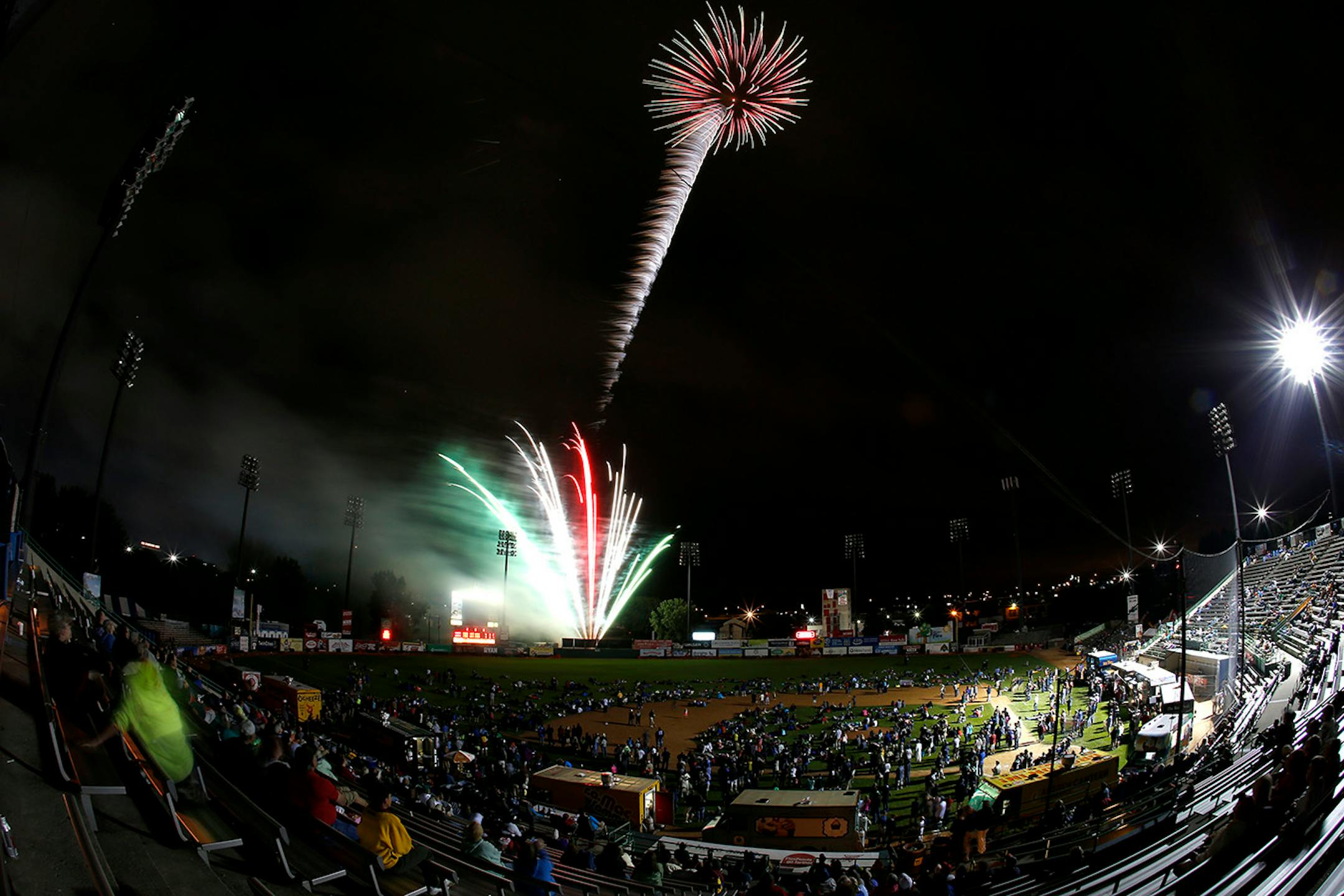 Fans watched a fireworks show at the end of the St. Paul Saints final game at Midway Stadium on Thursday night. ] CARLOS GONZALEZ cgonzalez@startribune.com - August 28, 2014, St. Paul, Minn., Midway Stadium, St. Paul Saints baseball vs. Winnipeg - Final Saints game at Midway Stadium