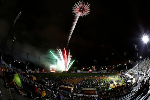 Fans watched a fireworks show at the end of the St. Paul Saints final game at Midway Stadium on Thursday night. ] CARLOS GONZALEZ cgonzalez@startribun