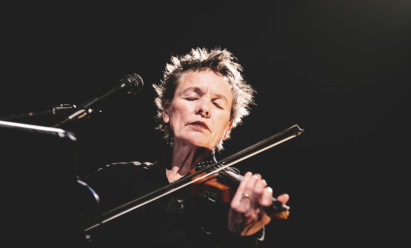 PHOTO MOVED IN ADVANCE AND NOT FOR USE - ONLINE OR IN PRINT - BEFORE FEB. 21, 2016. -- FILE -- Laurie Anderson performs with the Kronos Quartet at the Big Ears festival in Knoxville, Tenn., March 28, 2015. Anderson returns to Big Ears this year and is also scheduled for Moogfest, which returns after a hiatus with a change of location, to Durham, N.C., May 19-22, 2016. (Jake Giles Netter/The New York Times) ORG XMIT: XNYT84