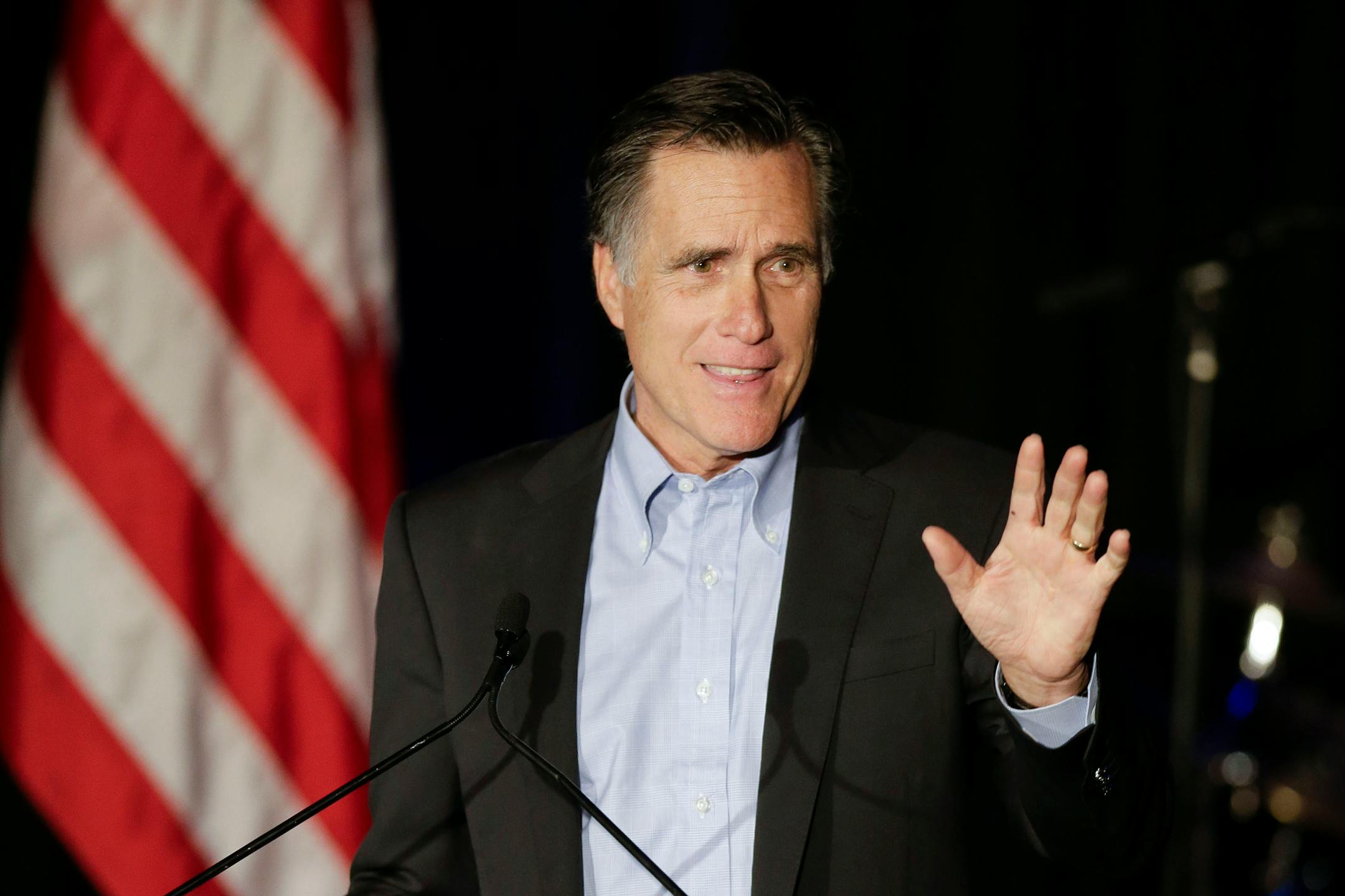 Mitt Romney, the former Republican presidential nominee, speaks during the Republican National Committee's winter meeting aboard the USS Midway Museum Friday, Jan. 16, 2015, in San Diego.