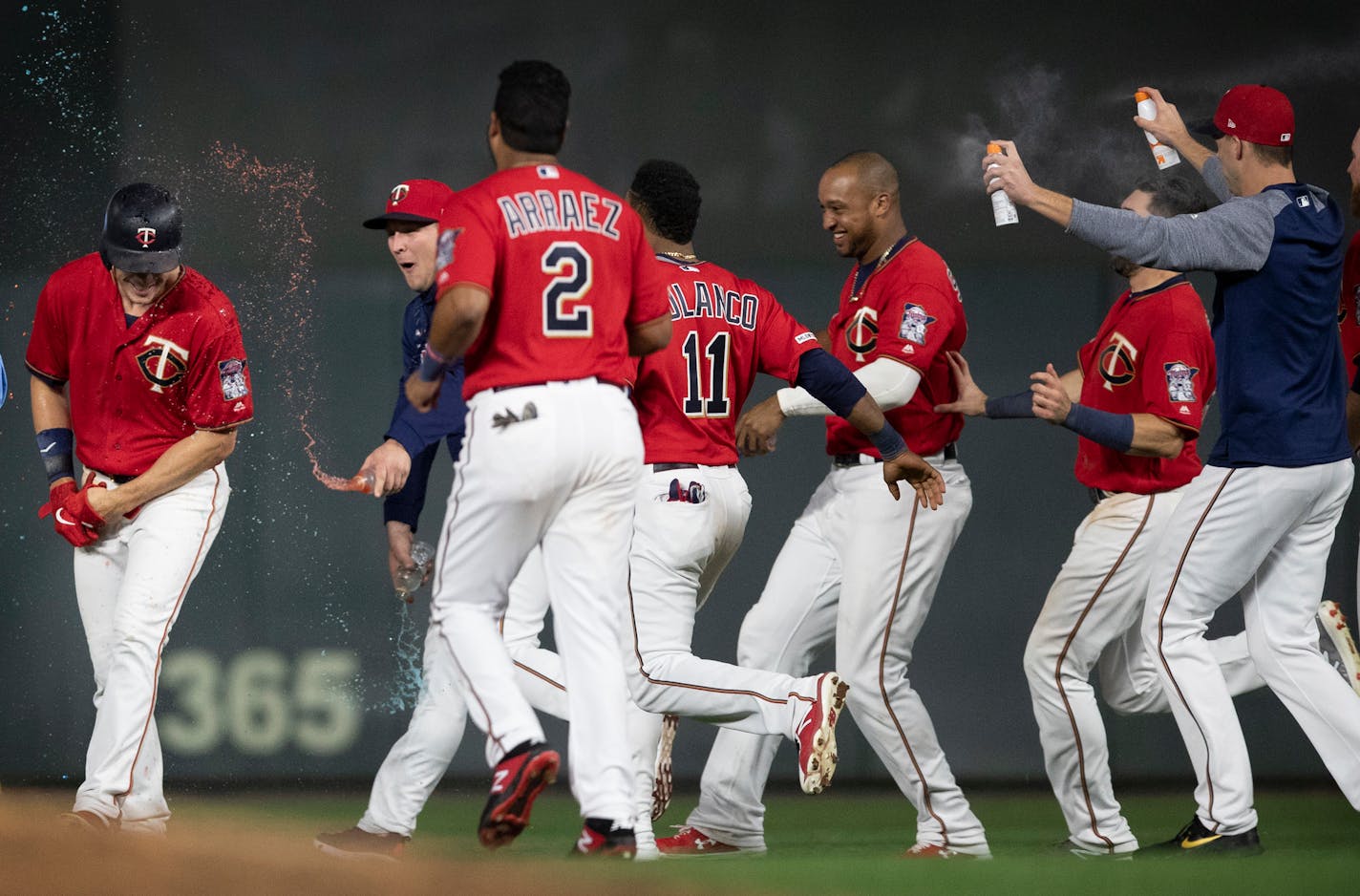 Twins players celebrated Max Kepler's RBI single in the 17th inning, scoring Luis Aaraez for the win at Target Field early Wednesday morning