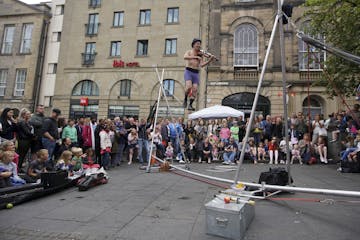 A street entertainer just off the Royal Mile during the 70th edition of the Edinburgh Fringe Festival in Scotland, Aug. 13, 2017. Edinburgh’s F