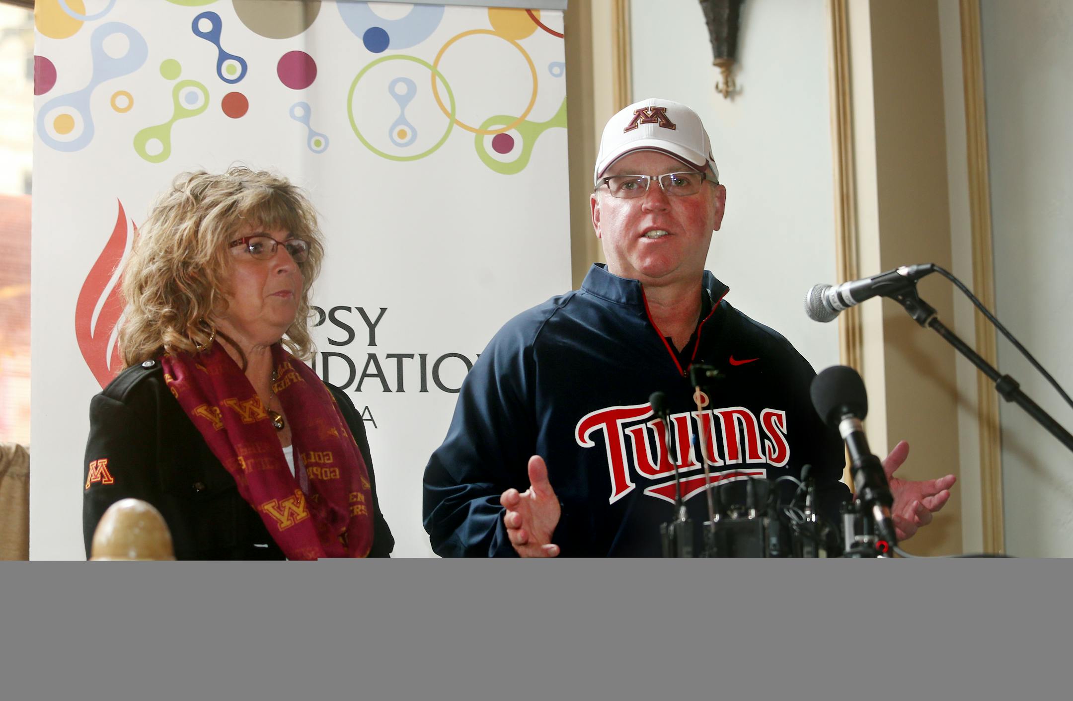 In 2014, University of Minnesota head football coach Jerry Kill and his wife, Rebecca, spoke about the foundation's Rise Above Seizures Day, where people across the region will raise epilepsy awareness with creative displays of balloons and educational events.