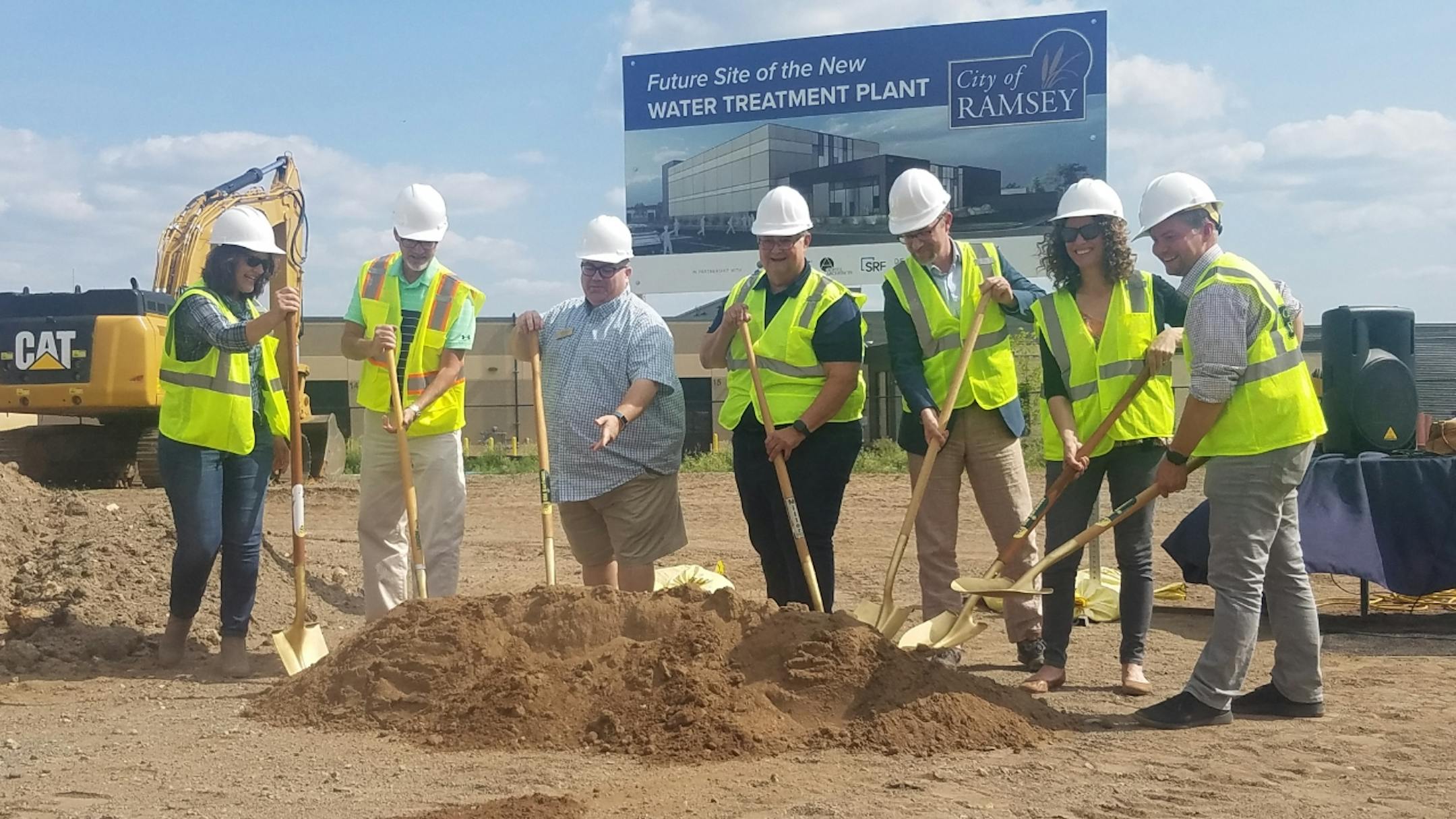 Ramsey City Council members participate in a ceremonial groundbreaking on Tuesday July 18, 2023.